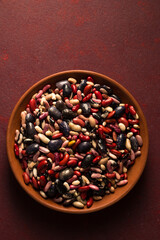 A large bowl of colorful organic beans