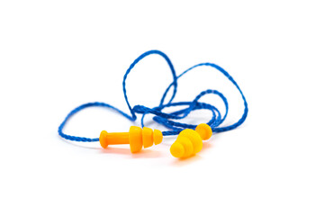 Bright earplugs on a white background
