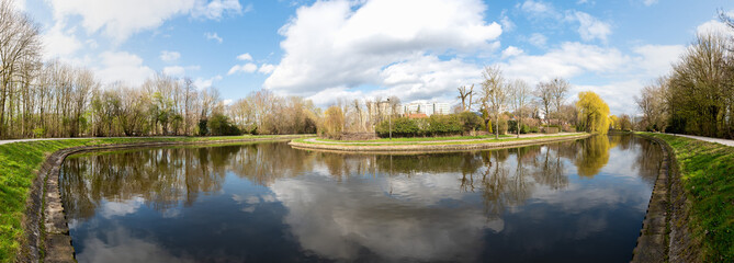 Extra large panoramic view of a waterpond around the Ghent Urban zone