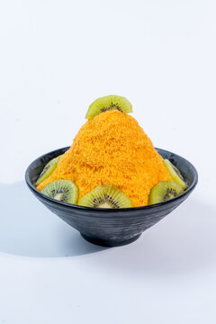 ฺBingsu Thai tea and giwi on white blackground