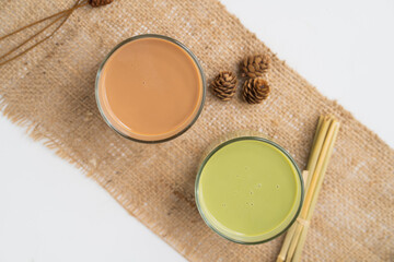 green tea and thai tea,top view on white blackground
