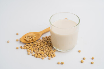 Health Benefits of Soy Milk,Soy milk in glass and soya bean isolated on white background