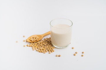 Health Benefits of Soy Milk,Soy milk in glass and soya bean isolated on white background