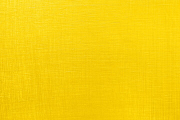 Golden textured background. Gold-plated, yellow material. Abstract image.