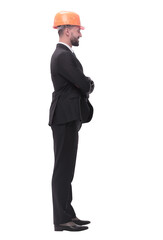 side view.businessman in helmet looking at copy space.