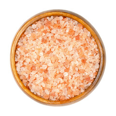 Himalayan salt, coarse crystals, in a wooden bowl. Rock salt, halite, with a pinkish tint, due to...