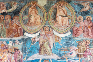 Detail of medieval fresco showing saints and angels in heaven
