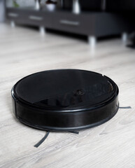 Automated vacuum cleaning robot in living room