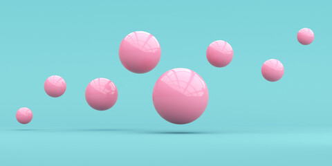3d render. Pink spheres of different sizes fly against a blue background.