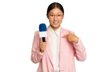 Young TV Asian presenter isolated on green chroma background person pointing by hand to a shirt copy space, proud and confident
