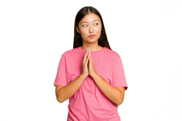 Young Asian woman isolated on green chroma background making up plan in mind, setting up an idea.