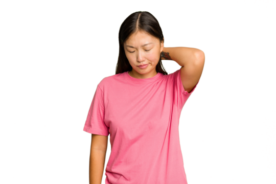 Young Asian woman isolated on green chroma background suffering neck pain due to sedentary lifestyle.