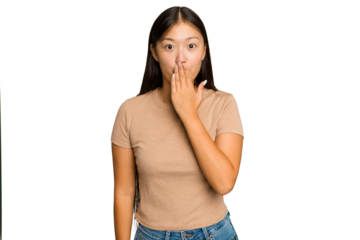 Young Asian woman isolated on green chroma background shocked, covering mouth with hands, anxious to discover something new.