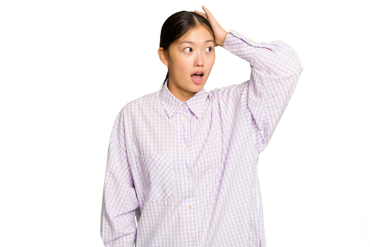 Young Asian woman isolated on green chroma background being shocked, she has remembered important meeting.