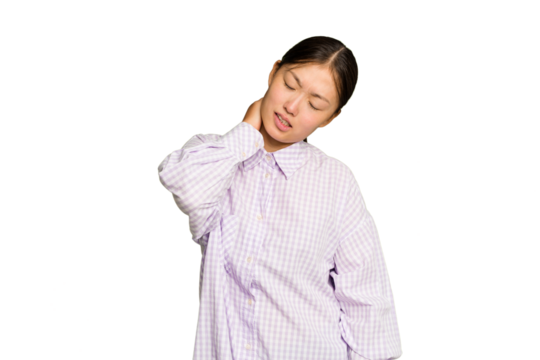 Young Asian woman isolated on green chroma background suffering neck pain due to sedentary lifestyle.