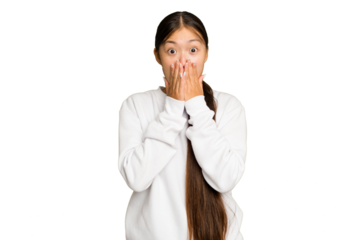 Young Asian woman isolated on green chroma background shocked, covering mouth with hands, anxious to discover something new.