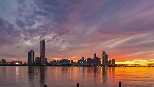 Beautiful Sky Sunset over the han river near the shore. 63 building, at Yeouido District in Seoul City, South Korea. (zoom in)