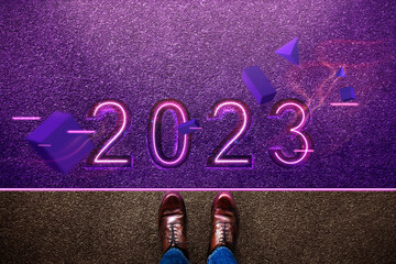 2023 Year Concept. Top View of Businessman Standing on Starting Line. Get Ready to Steps Forward to...