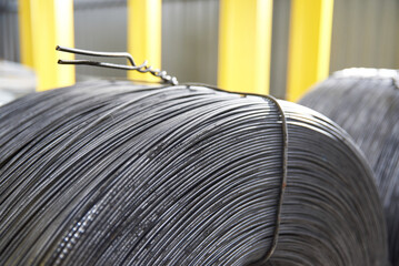 New metal wire wound into round coils in stock
