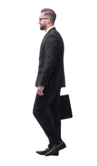 Obraz na płótnie Canvas side view . businessman with leather briefcase stepping forward.