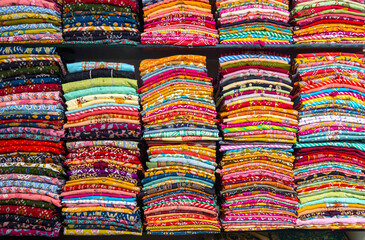 Shelves with sari or saree and other Indian clothes in India