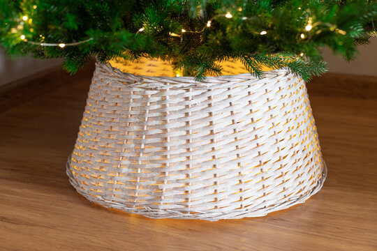 white wicker basket for Christmas tree. Christmas tree base cover. closeup