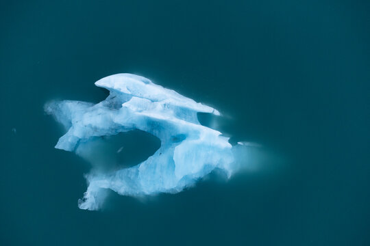 Textured surface of frozen lake with glaciers