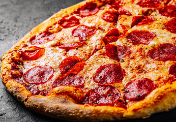 Pepperoni Pizza with cheese, salami, Tomato sauce, pepper, Spices