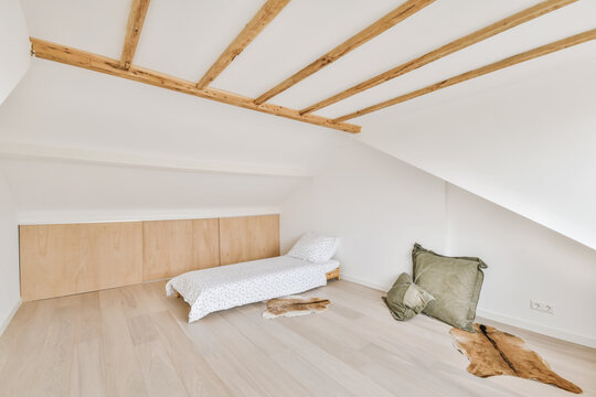 Bedroom interior with wooden beam ceiling