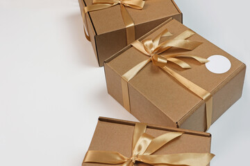 Packaging for gift. Cardboard boxes with satin ribbon. A surprise for the holiday. Flat lay.Top view.Copy space.