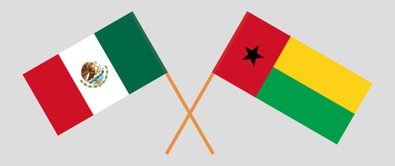 Crossed flags of Mexico and Guinea-Bissau. Official colors. Correct proportion