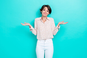 Photo of pretty cute lady wear stylish trendy outfit raise arm palm grimace cant help you excuse me isolated on cyan color background