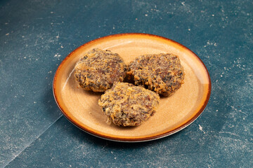 Indian food Jali kabab with tomato sauce served in a dish isolated on background top view