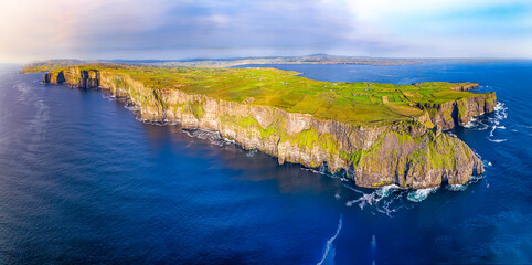 Scenic View Of Cliffs Of Moher, Liscannor, Ireland  The Cliffs of Moher in County Clare are...