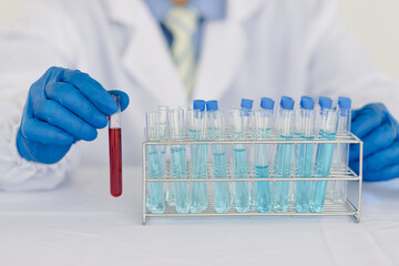 Scientists work with in vitro reagents in laboratories and draw conclusions from their research.