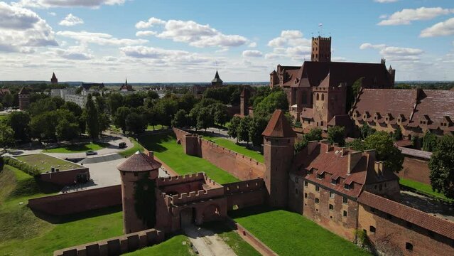View from the drone at the medieval Teutonic castle in Malbork on the Nogat River on a sunny ,autumn day.