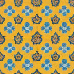 Yellow and azure floral seamless pattern with texture of Persian wool carpet