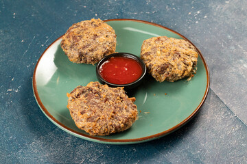 Indian food Jali kabab with tomato sauce served in a dish isolated on background top view