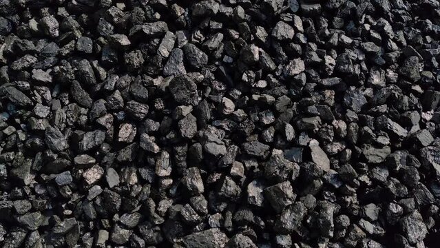Black coal on the ground