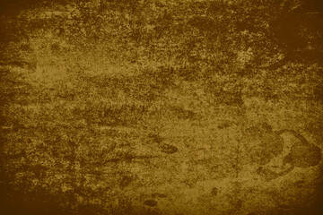 Blurred vintage retro brown background with stains and scratches. Old dark paper.