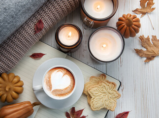 Fall flat lay with coffee and autumn decor