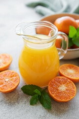 Jug of fresh orange tangerine juice