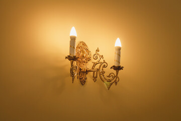 Decorative vintage wall sconce lamp candle with warm light