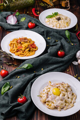 different types of italian pasta in bowls