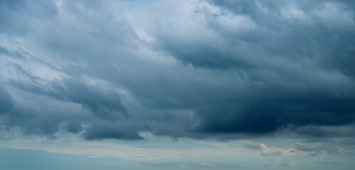 Fototapeta na wymiar Dark and dramatic clouds before rain