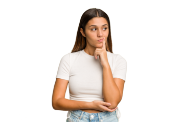 Young Indian woman isolated cutout removal background looking sideways with doubtful and skeptical expression.