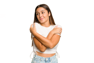 Young Indian woman isolated cutout removal background hugs, smiling carefree and happy.