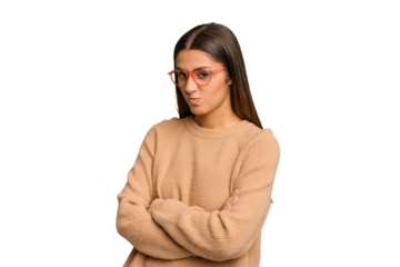 Young Indian woman isolated cutout removal background frowning face in displeasure, keeps arms folded.