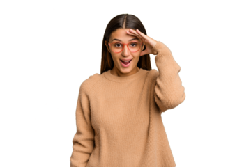 Young Indian woman isolated cutout removal background shouts loud, keeps eyes opened and hands tense.