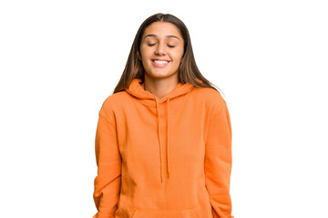 Young Indian woman isolated cutout removal background laughs and closes eyes, feels relaxed and happy.